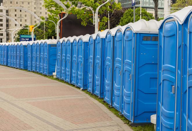 a row of portable restrooms at a fairground, offering visitors a clean and hassle-free experience in gresham